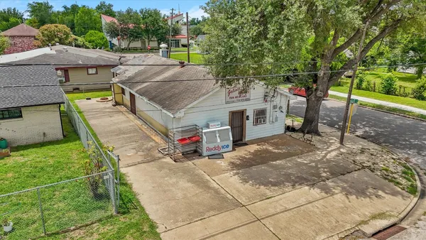 an aerial view of a house with a garden