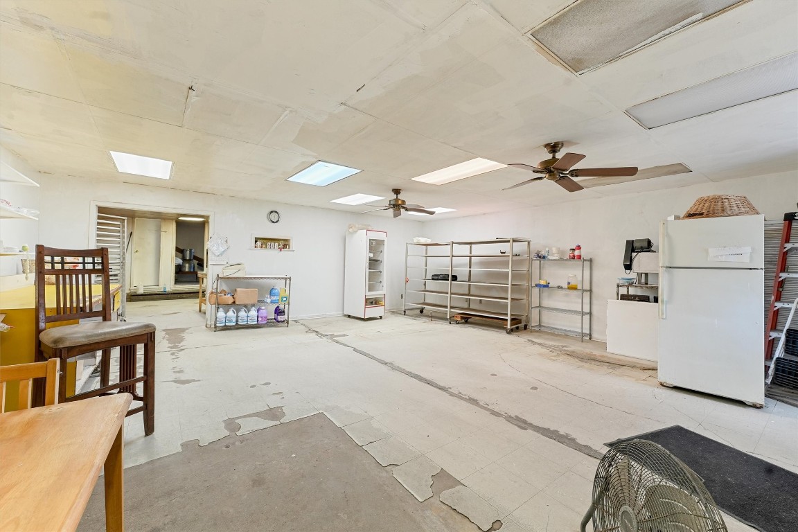 2915 Kashmere Street Houston, TX 77026 - Photo 8 of 20 a view of a livingroom with furniture and a ceiling fan