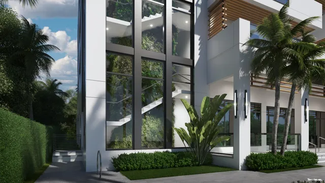 front view of a house with a tree