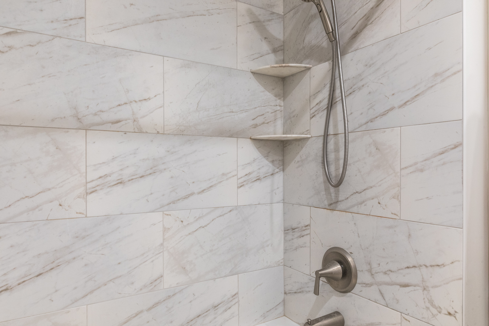 475 Amherst Avenue Des Plaines, IL 60016 - Photo 15 of 29 a close view of a shower in a bathroom