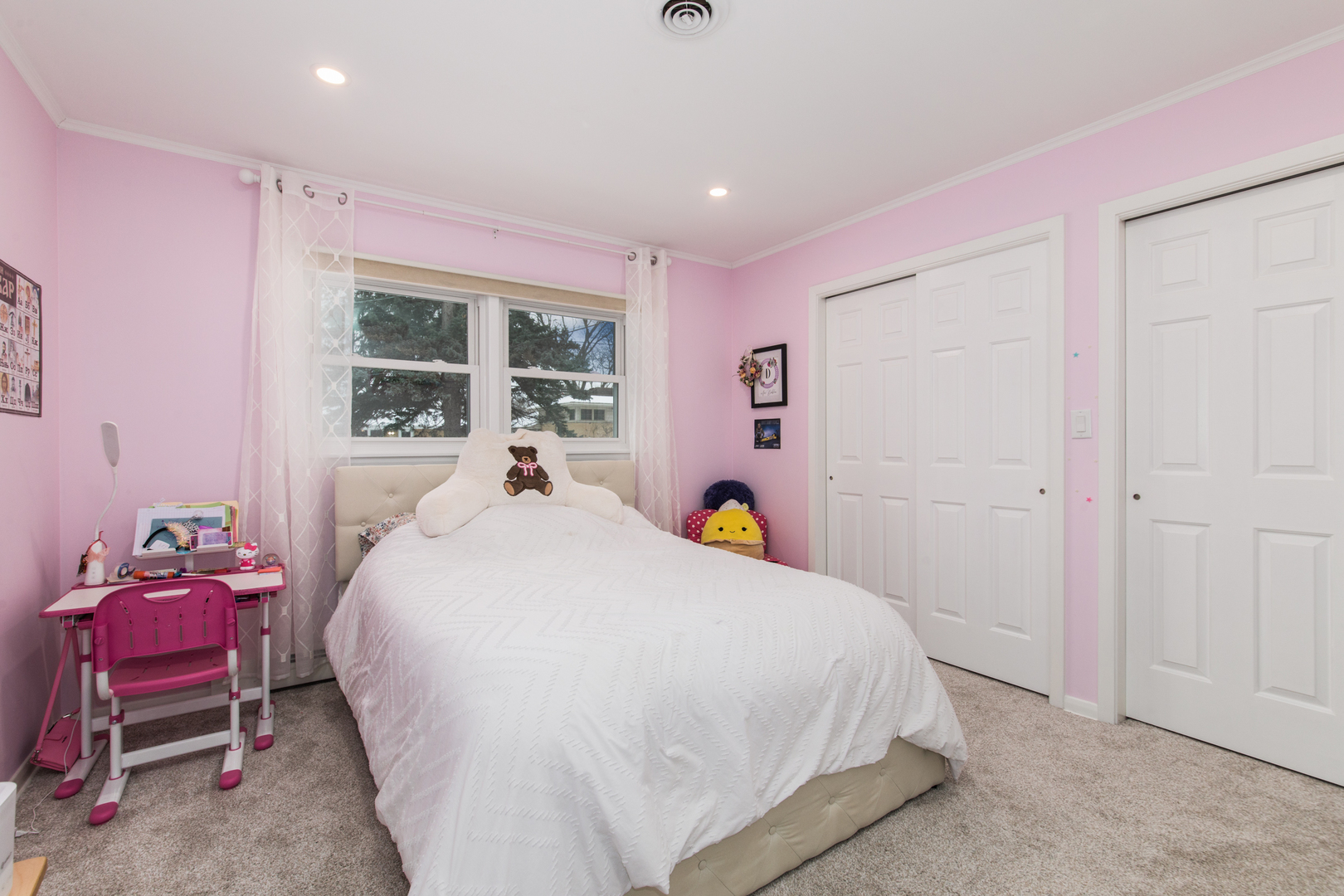 475 Amherst Avenue Des Plaines, IL 60016 - Photo 16 of 29 a bed room with a bed and a chair