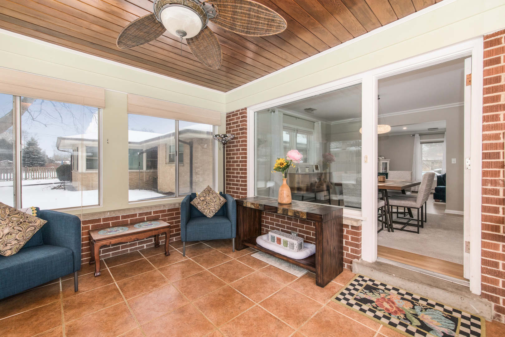 475 Amherst Avenue Des Plaines, IL 60016 - Photo 9 of 29 a living room with furniture a rug and a chandelier