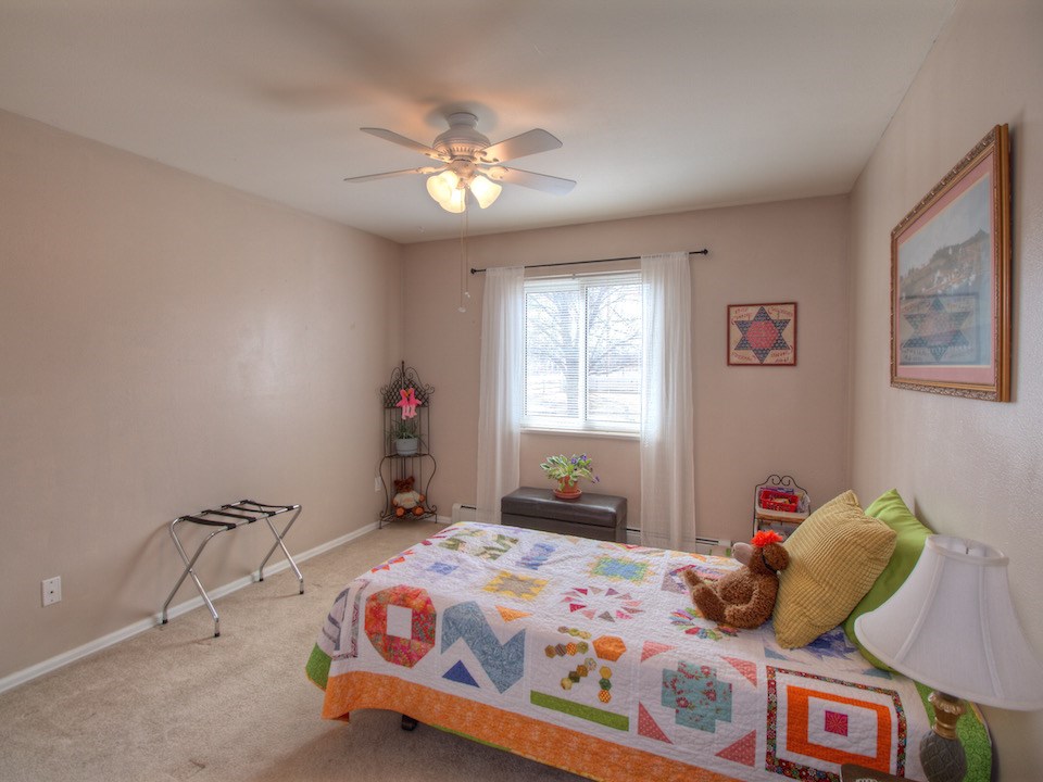 2949 Erika Road Grand Junction, CO 81504 - Photo 11 of 20 a bedroom with a bed and a window