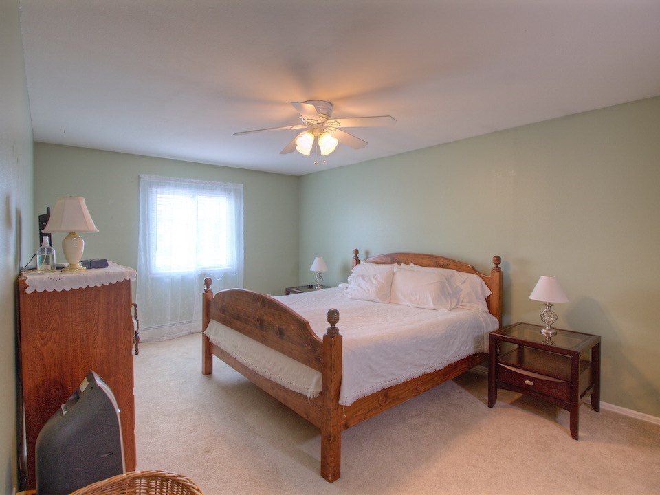 2949 Erika Road Grand Junction, CO 81504 - Photo 14 of 20 a bedroom with a bed and window