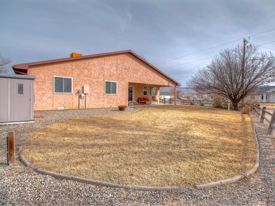 2949 Erika Road Grand Junction, CO 81504 - Photo 18 of 20 a view of a house with a yard