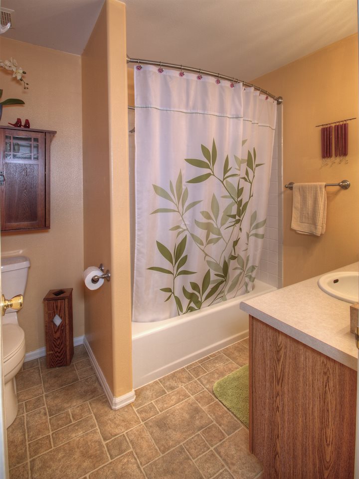 2949 Erika Road Grand Junction, CO 81504 - Photo 9 of 20 a bathroom with a sink a toilet and shower
