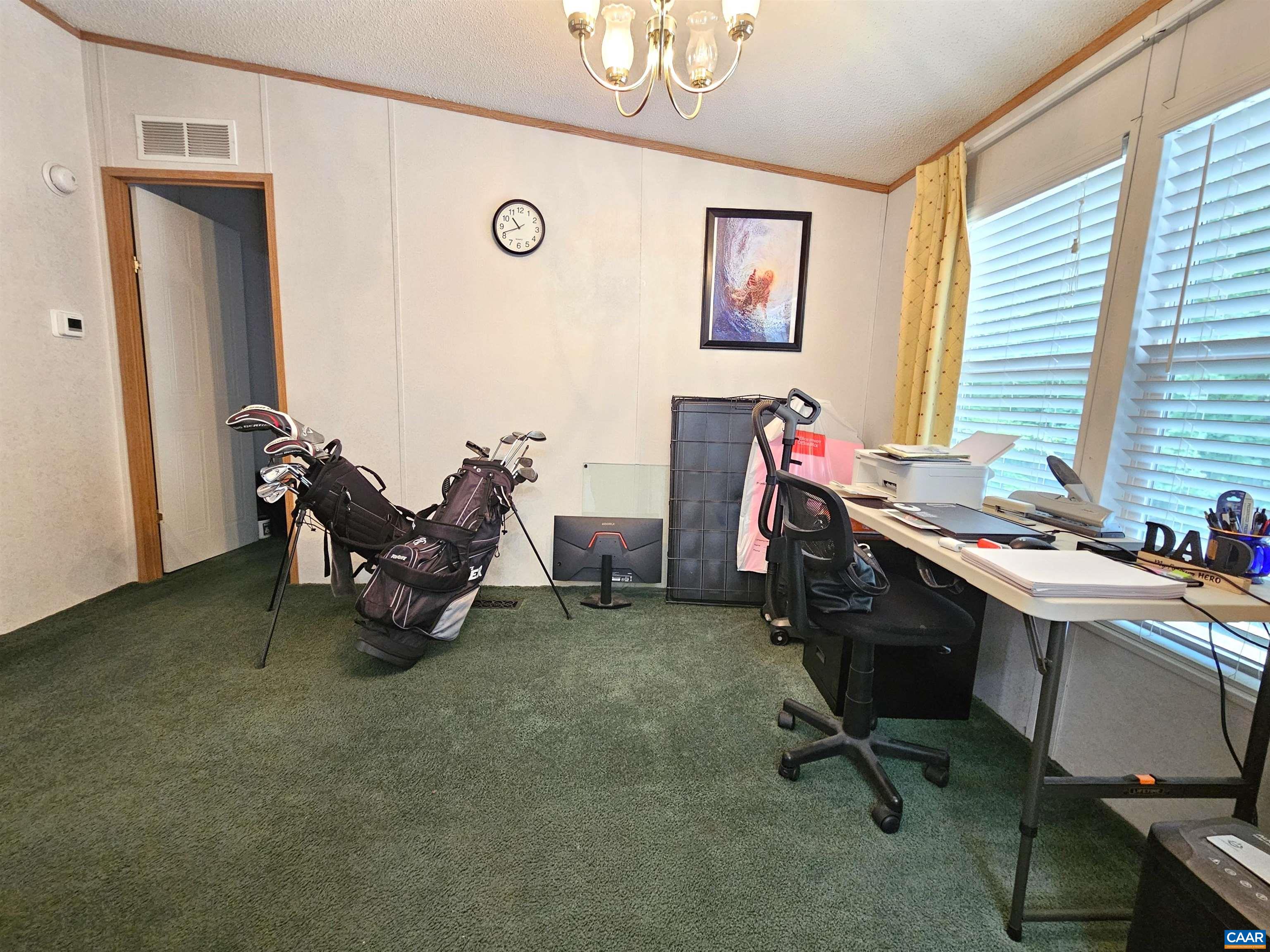 981 Scotts Bottom Road Dillwyn, VA 23936 - Photo 14 of 62 a view of a workspace with furniture and a window