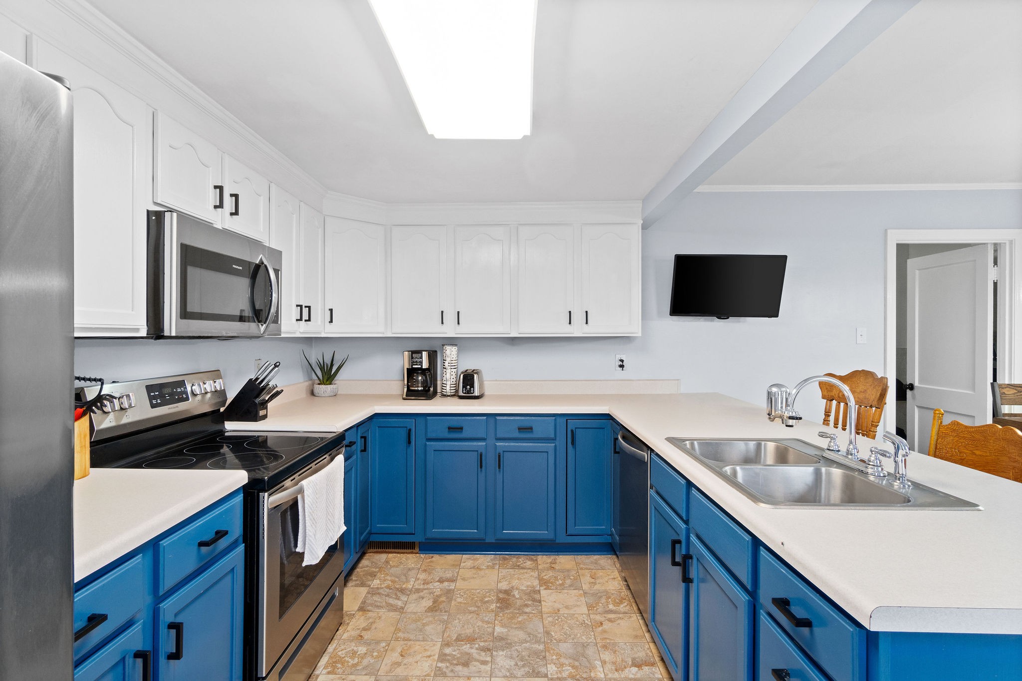4696 Chapel Hill Road Southside, TN 37171 - Photo 13 of 36 a kitchen with a sink stove and microwave