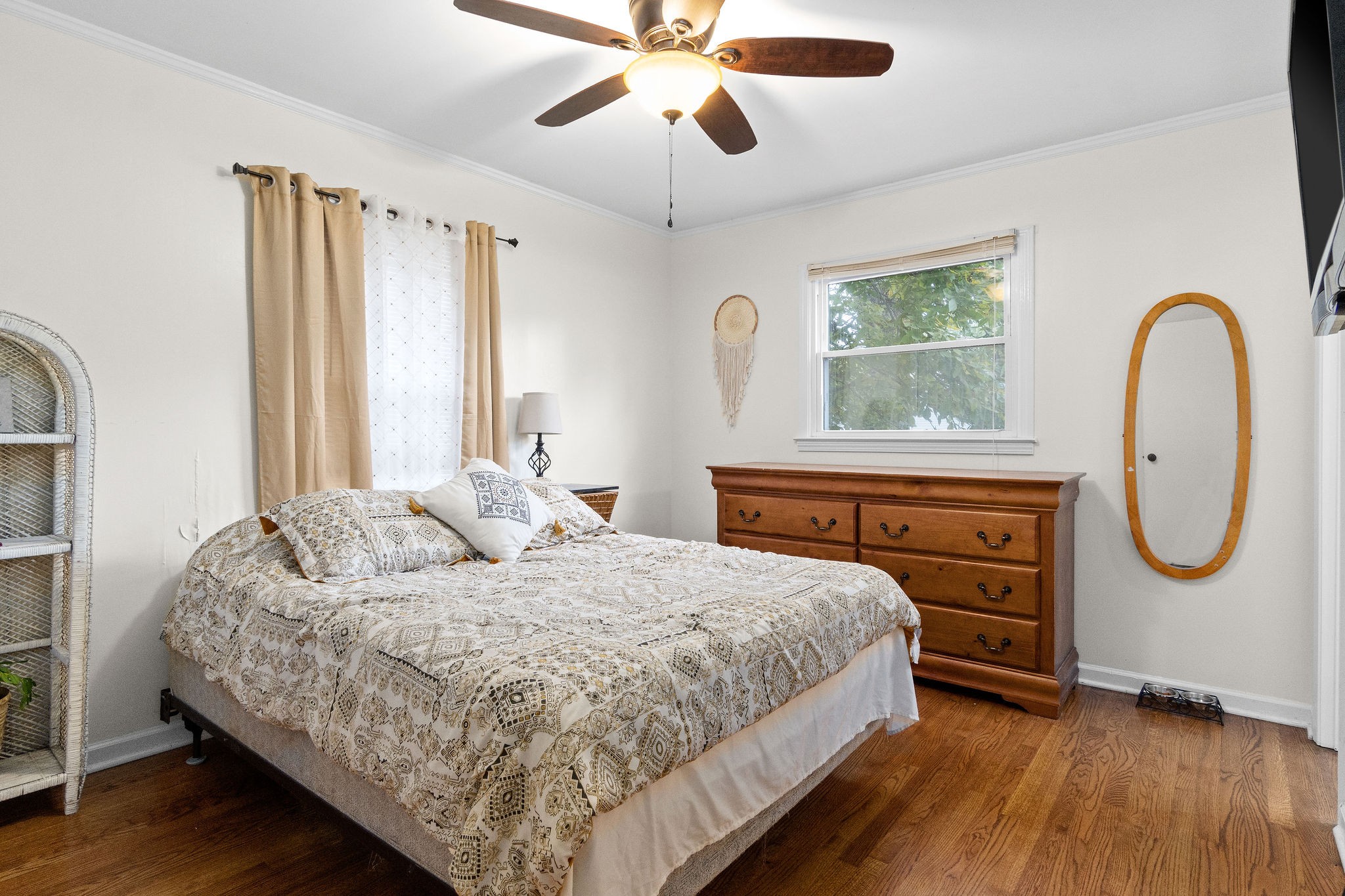 4696 Chapel Hill Road Southside, TN 37171 - Photo 27 of 36 a bedroom with a bed a dresser and window