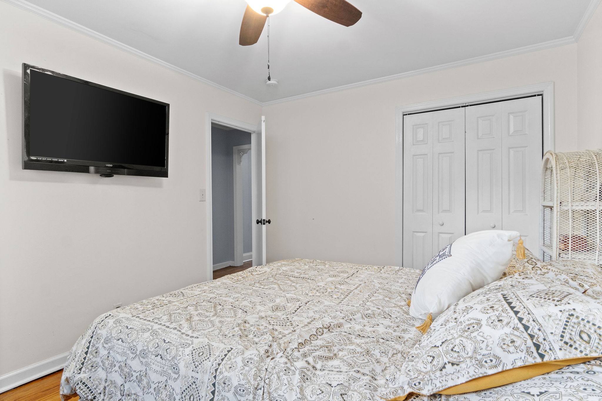 4696 Chapel Hill Road Southside, TN 37171 - Photo 28 of 36 a bedroom with a bed and a flat screen tv