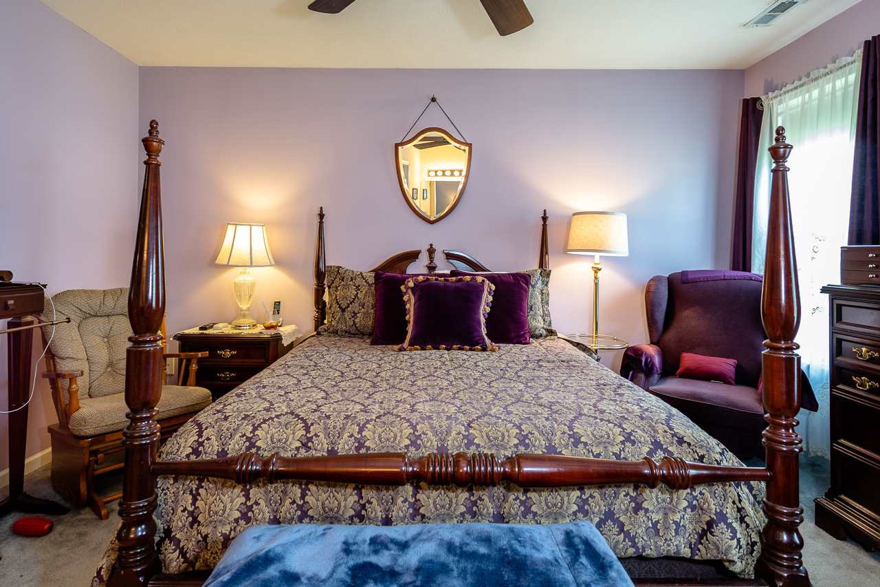 128 Gentry Road Weyers Cave, VA 24486 - Photo 23 of 48 a bedroom with a bed and dresser