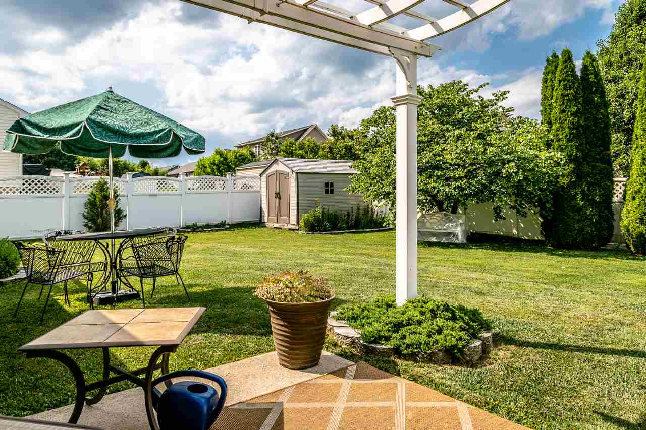 128 Gentry Road Weyers Cave, VA 24486 - Photo 41 of 48 a view of a patio with chairs and plants
