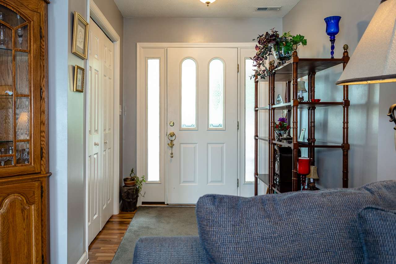 128 Gentry Road Weyers Cave, VA 24486 - Photo 8 of 48 a living room with furniture and a window