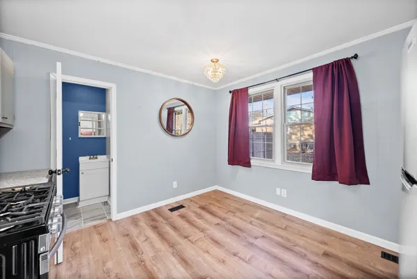 a bed room with a bed and a window