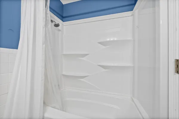 a bathroom with a bathtub