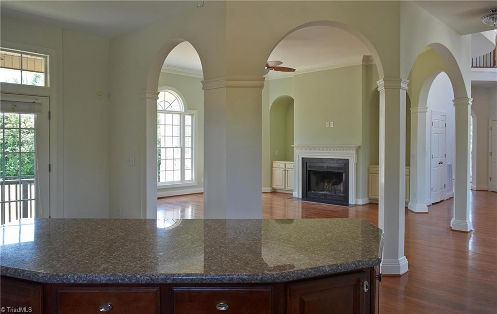 602 Bobcat Road Summerfield, NC 27358 - Photo 11 of 30 View of the living room from the island in the kitchen. You can be in the kitchen, but still feel a part of activities with your guests in the living room!
