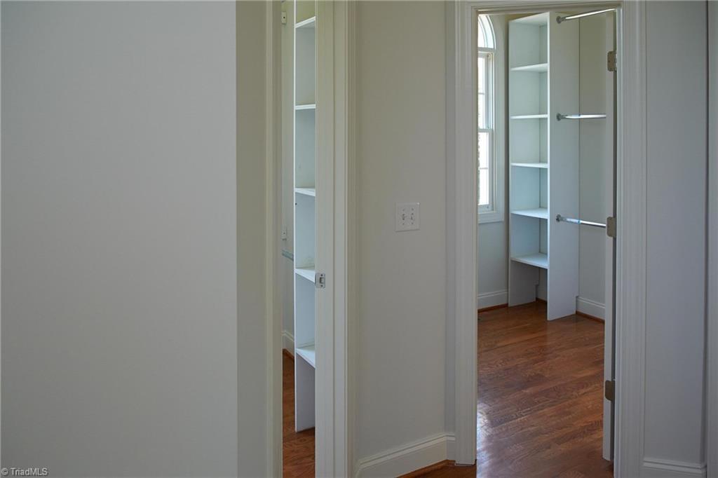 602 Bobcat Road Summerfield, NC 27358 - Photo 18 of 30 His and hers walk-in master closets. Note the windows for extra light!