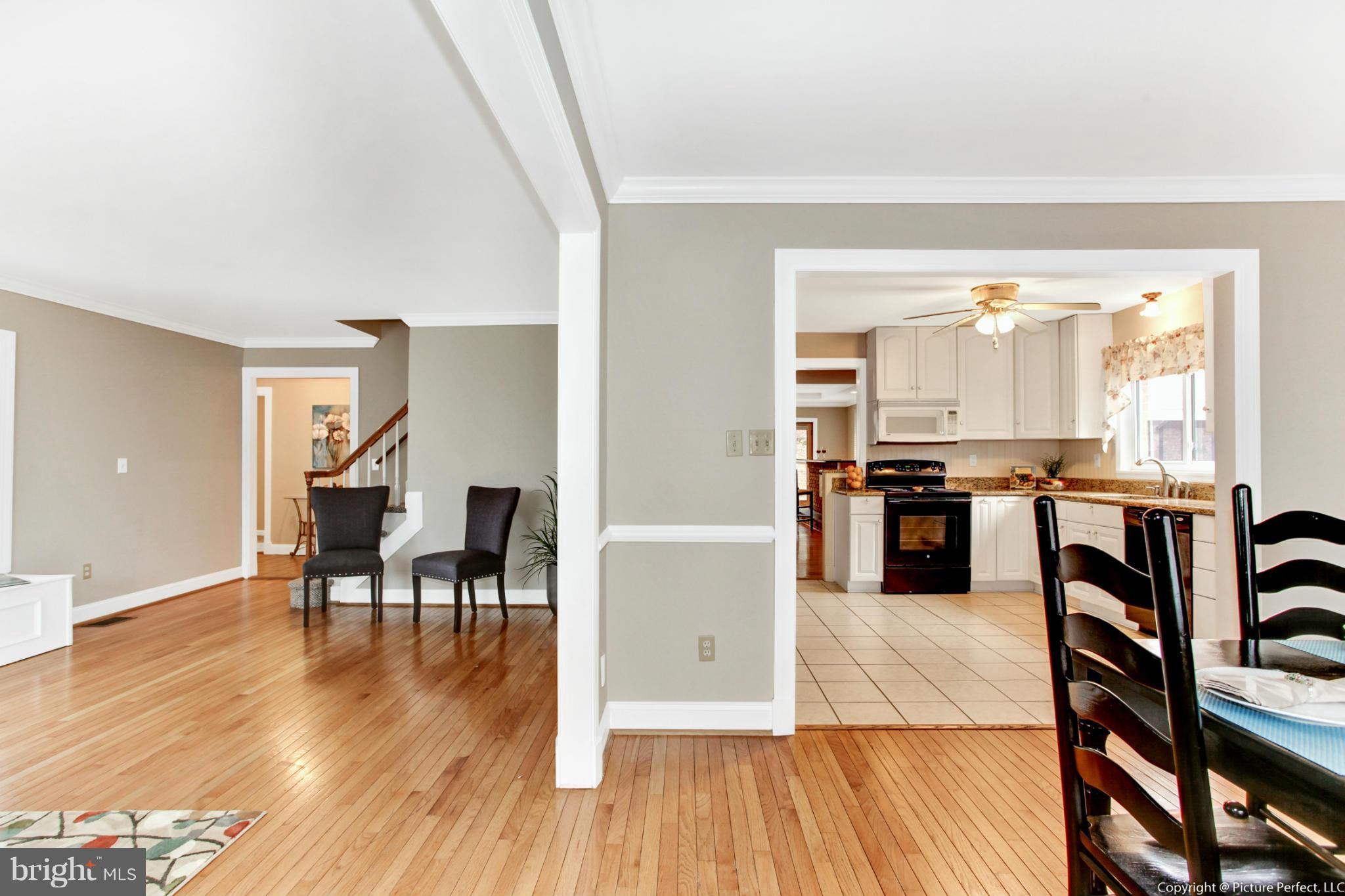 5225 Shookstown Road Frederick, MD 21702 - Photo 12 of 30 Living Room Leading Into Dining Room