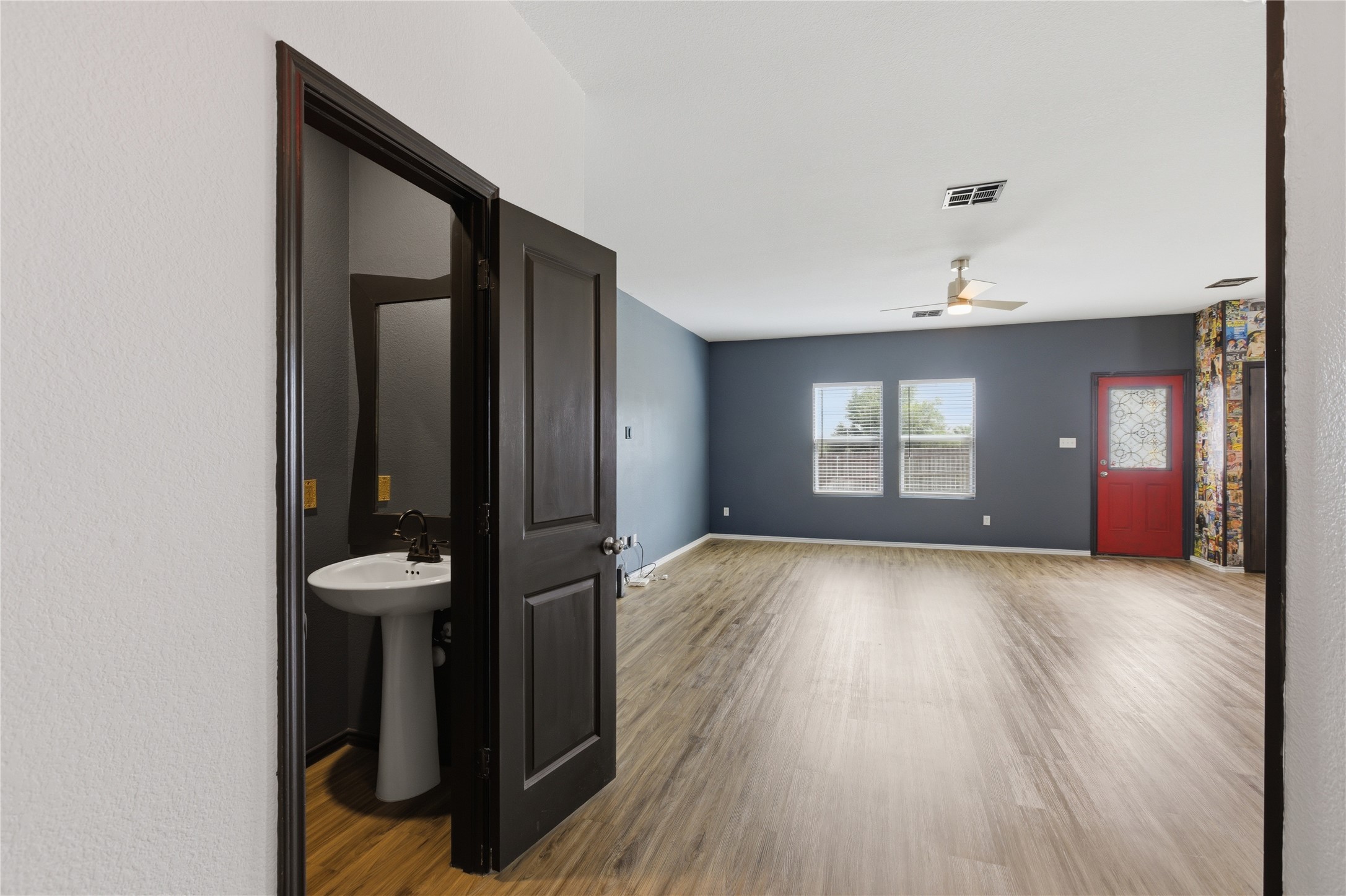 116 Night Riders Way Jarrell, TX 76537 - Photo 8 of 40 Downstairs Powder Room in Hallway near living room
