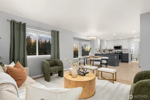 a large kitchen with lots of counter space and a sink