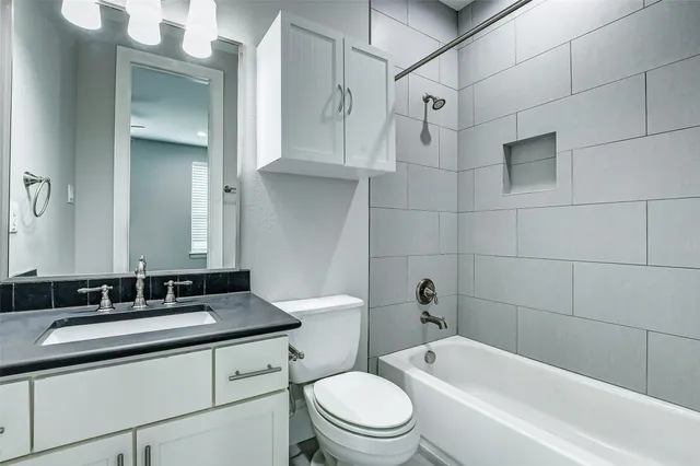 a view of a backyard with wooden fence