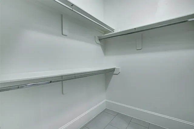 a view of a room with racks on the wall