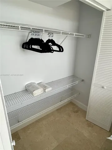 a view of a air conditioner and window in a room