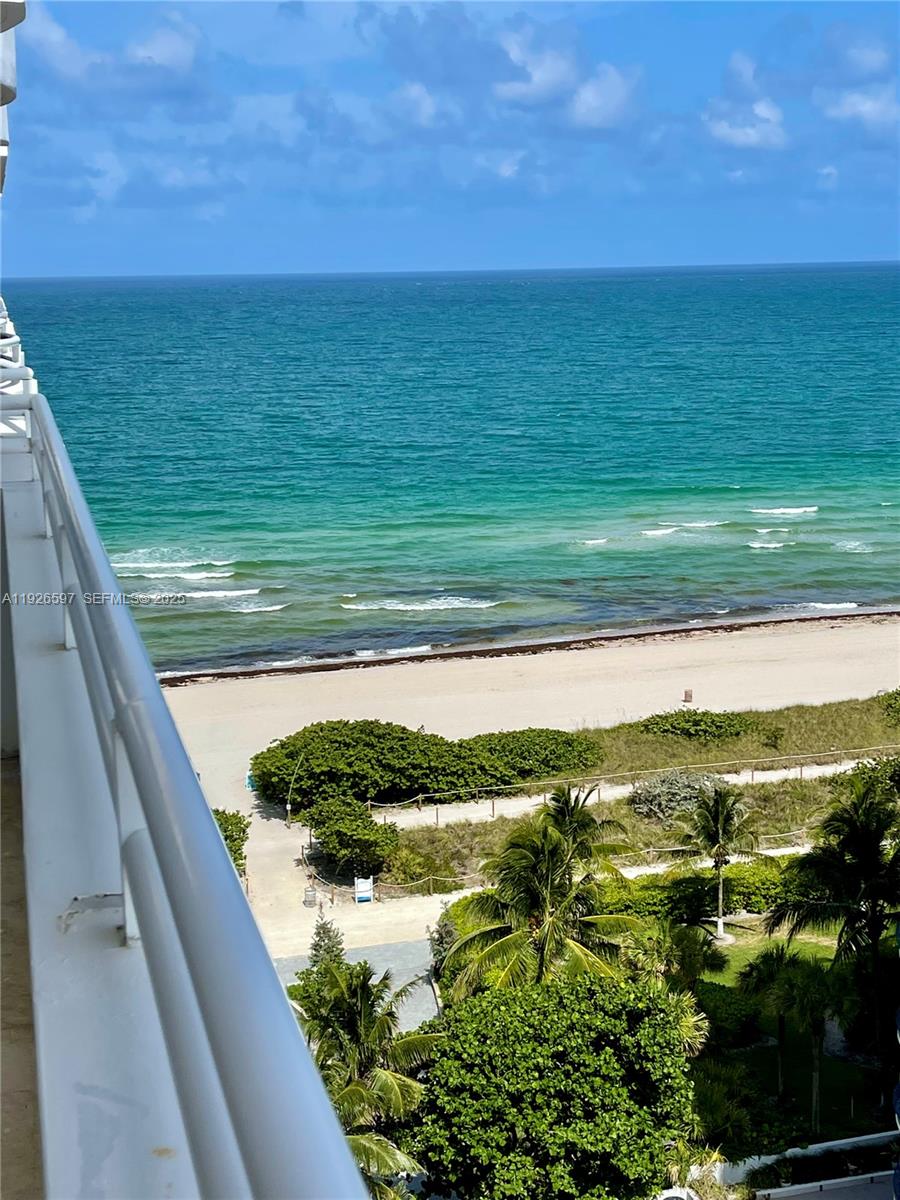 8911 Collins Avenue, Unit 1201 Surfside, FL 33154 - Photo 27 of 27 a view of a lake from a balcony