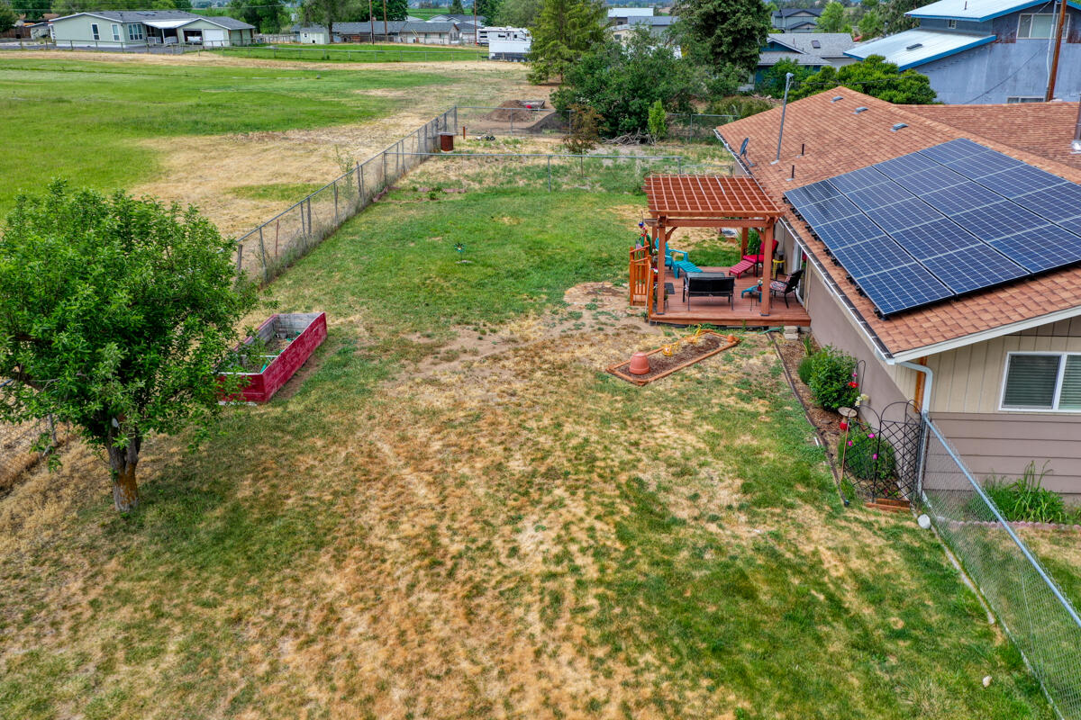 566 Northwest Mc Donald Road Prineville, OR 97754 - Photo 39 of 41 a small garden covered with tall trees