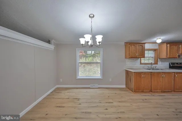 a view of a kitchen from the kitchen