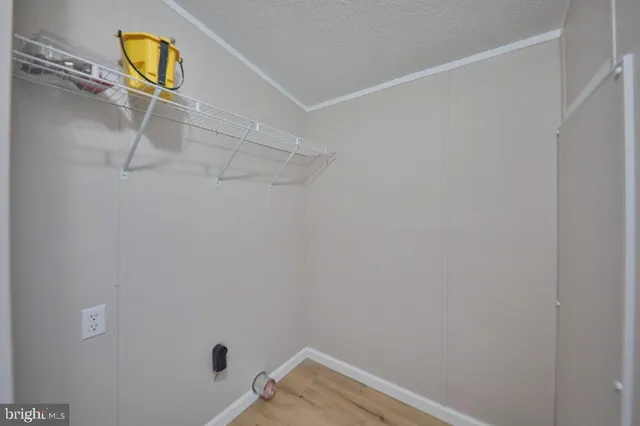 a bathroom with a shower and a shower head