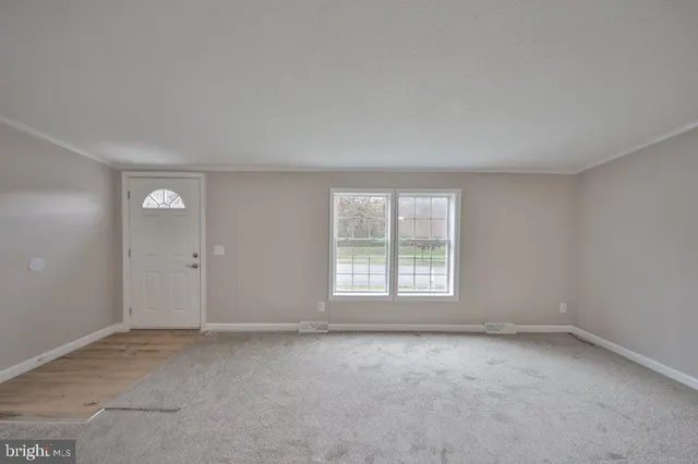 an empty room with a window