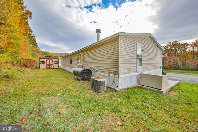 a view of a backyard with a garden