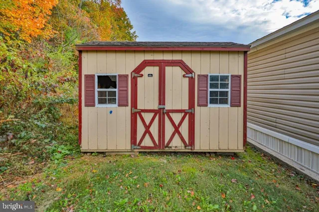 a view of entrance gate of a house