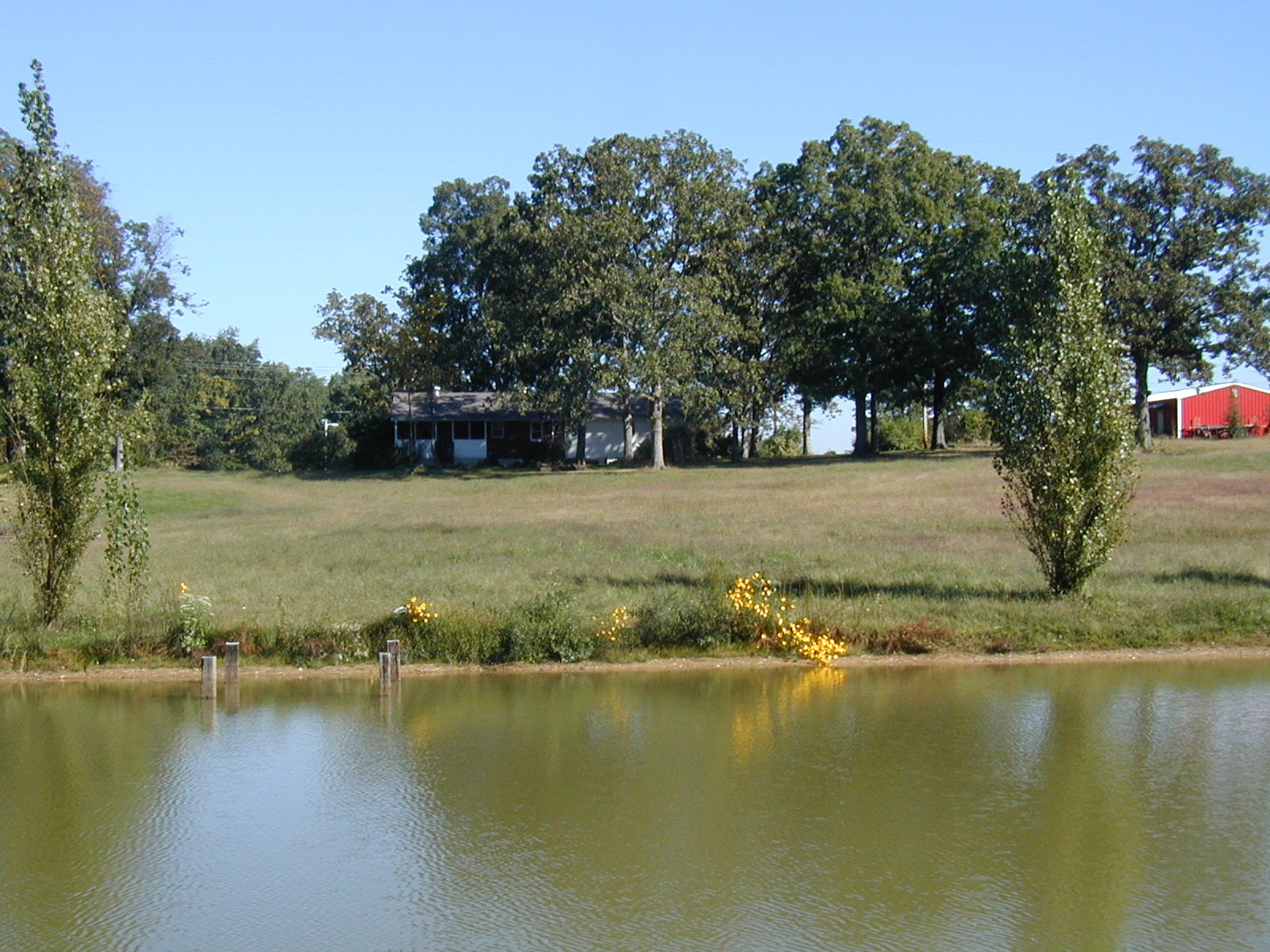 1030 Abiff Road Bon Aqua, TN 37025 - Photo 1 of 11 an aerial view of a houses with lake view
