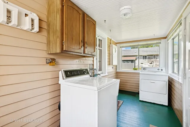 a utility room with washer and dryer