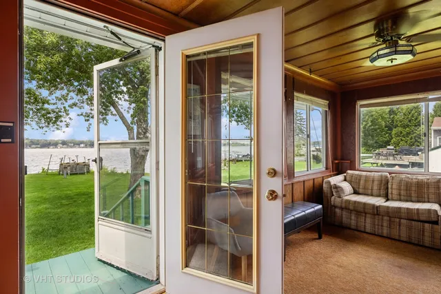a house view with couches in front of a house