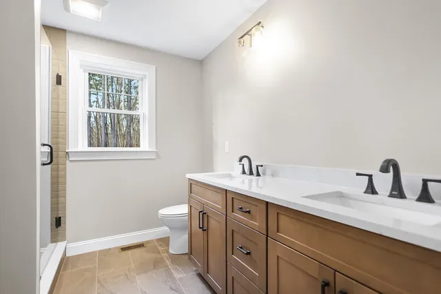 a bathroom with a sink and a toilet