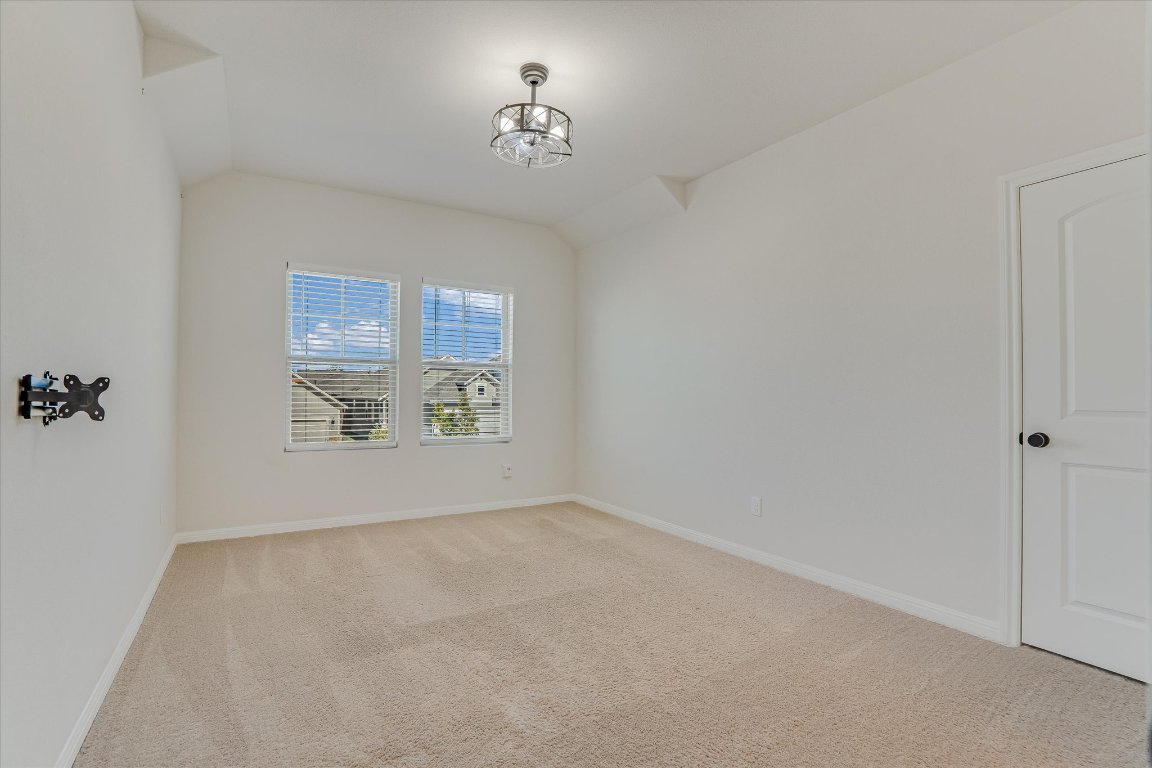 168 Kings Cyn Drive Dripping Springs, TX 78620 - Photo 18 of 25 a view of livingroom with hardwood floor and window