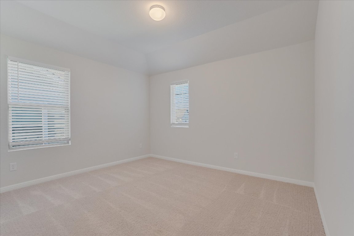 168 Kings Cyn Drive Dripping Springs, TX 78620 - Photo 20 of 25 an empty room with a window