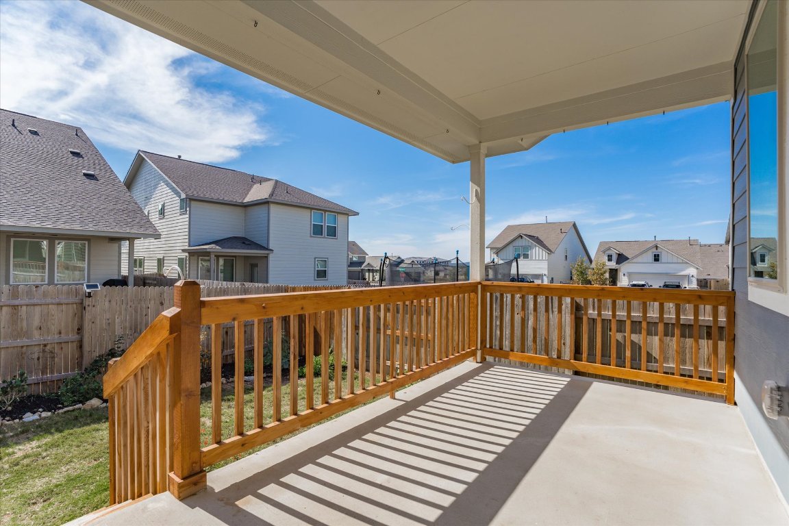168 Kings Cyn Drive Dripping Springs, TX 78620 - Photo 22 of 25 a view of a porch with wooden fence