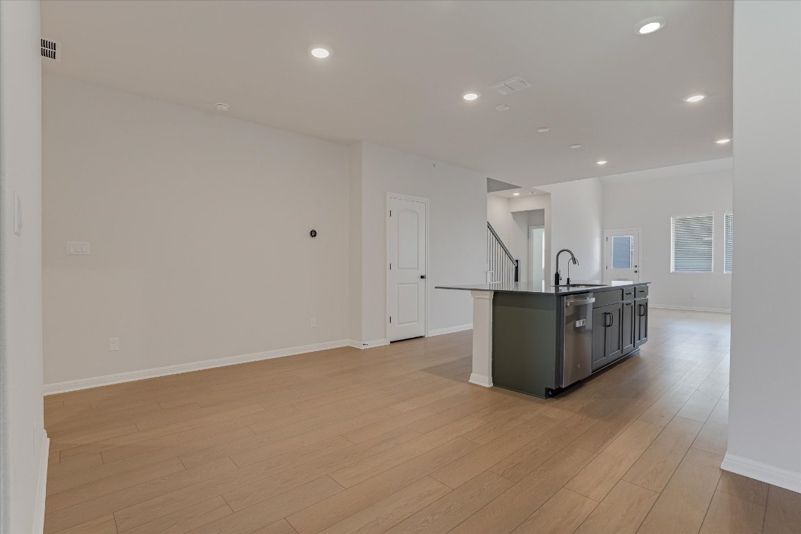 168 Kings Cyn Drive Dripping Springs, TX 78620 - Photo 25 of 25 a view of a room with wooden floor