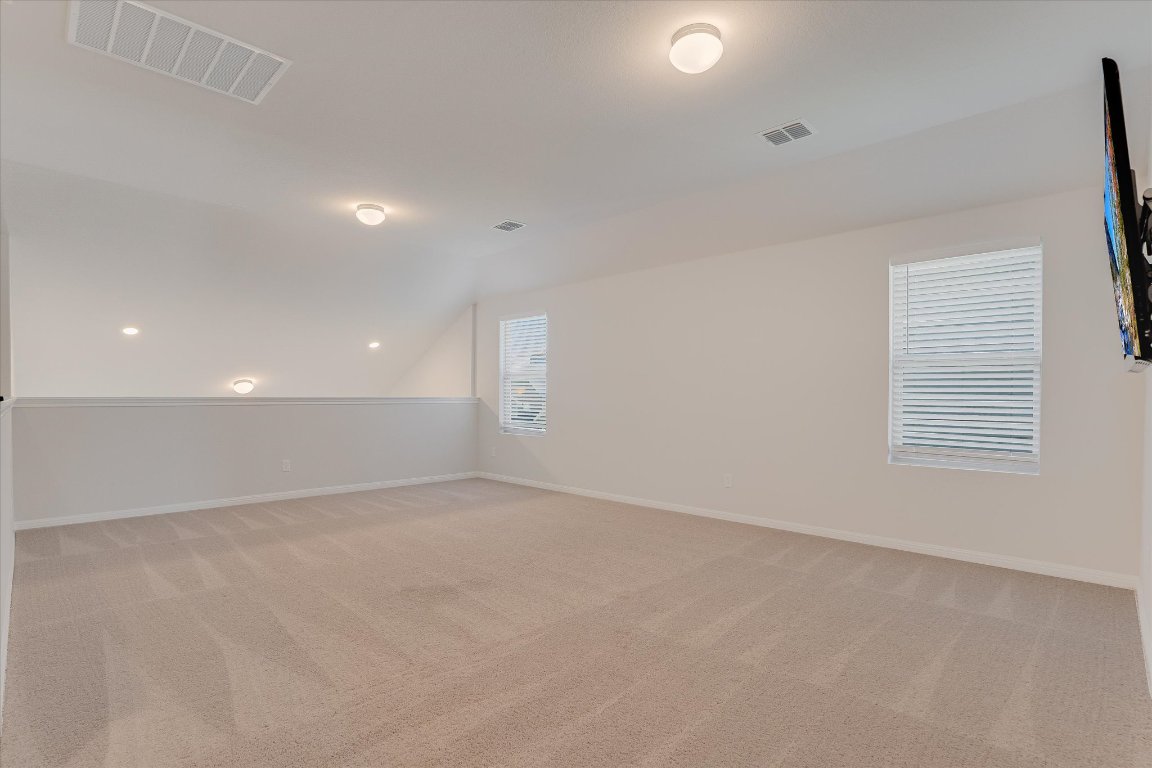 168 Kings Cyn Drive Dripping Springs, TX 78620 - Photo 9 of 25 an empty room with windows