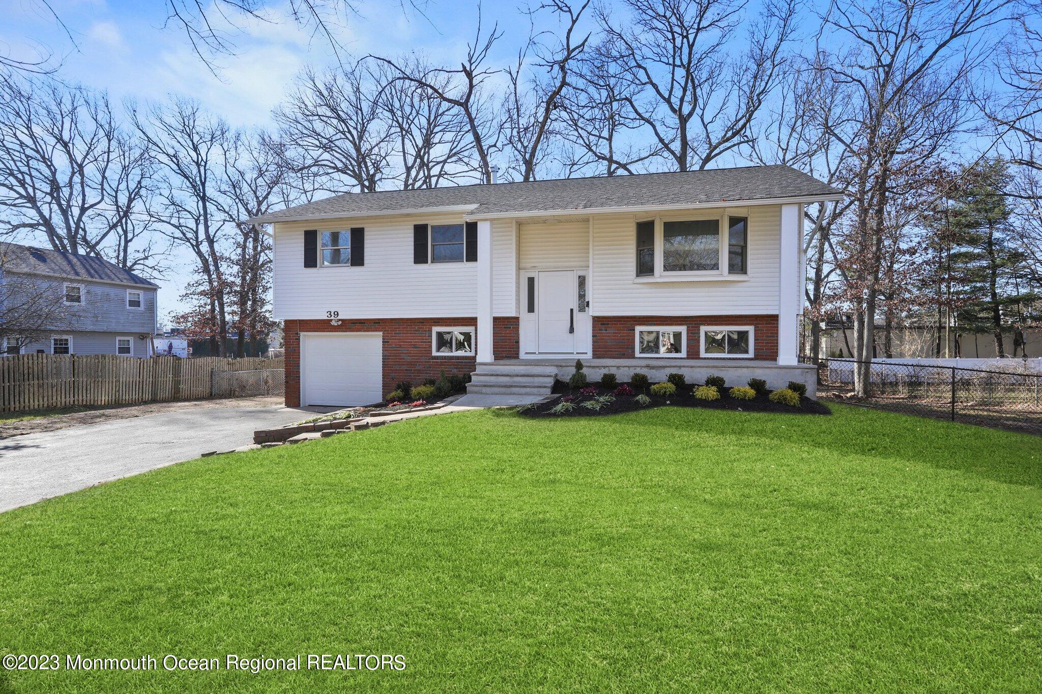39 Holiday Road Manalapan, NJ 07726 - Photo 2 of 29 FRONT