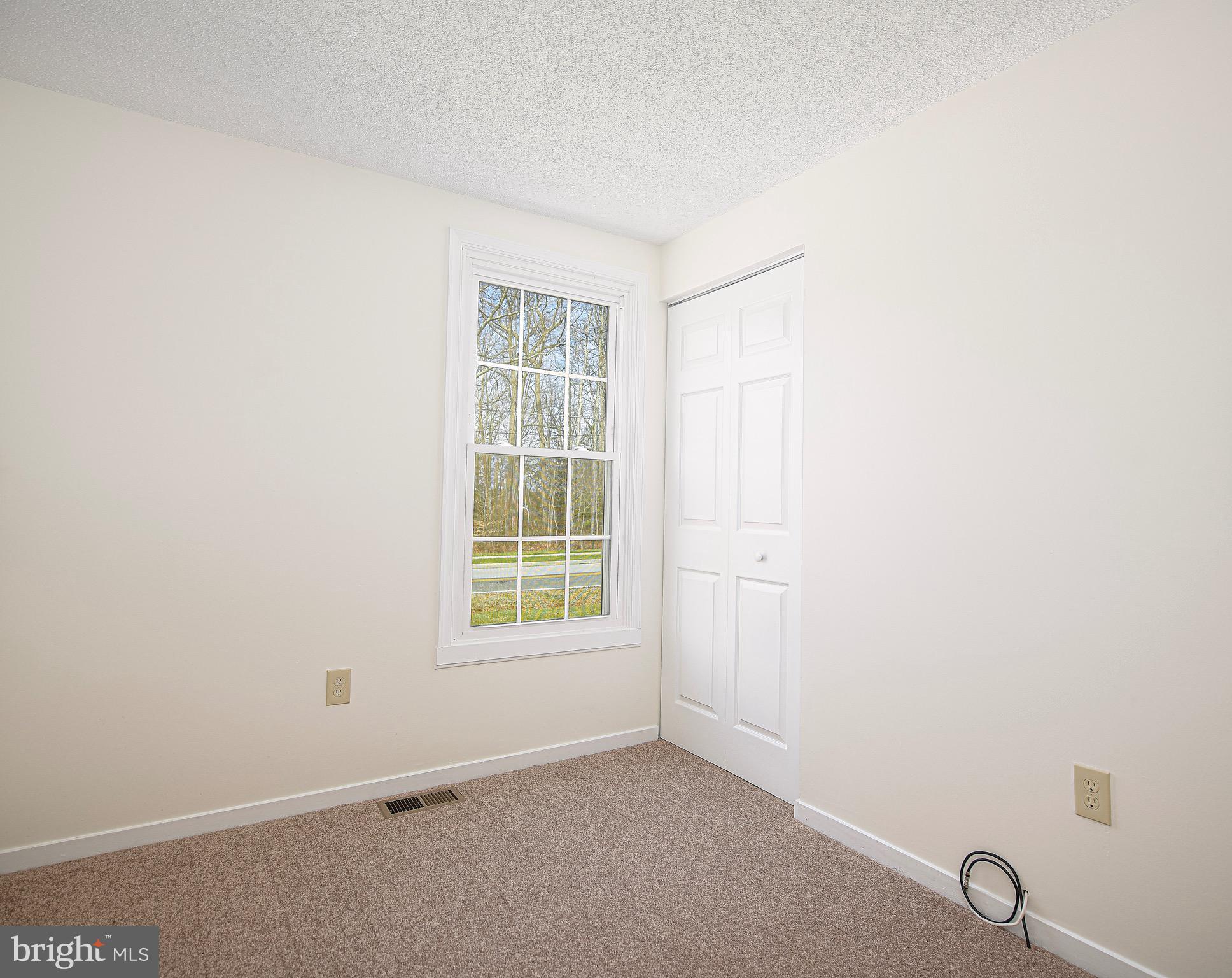 1811 Cape May Road Essex, MD 21221 - Photo 16 of 34 an empty room with windows