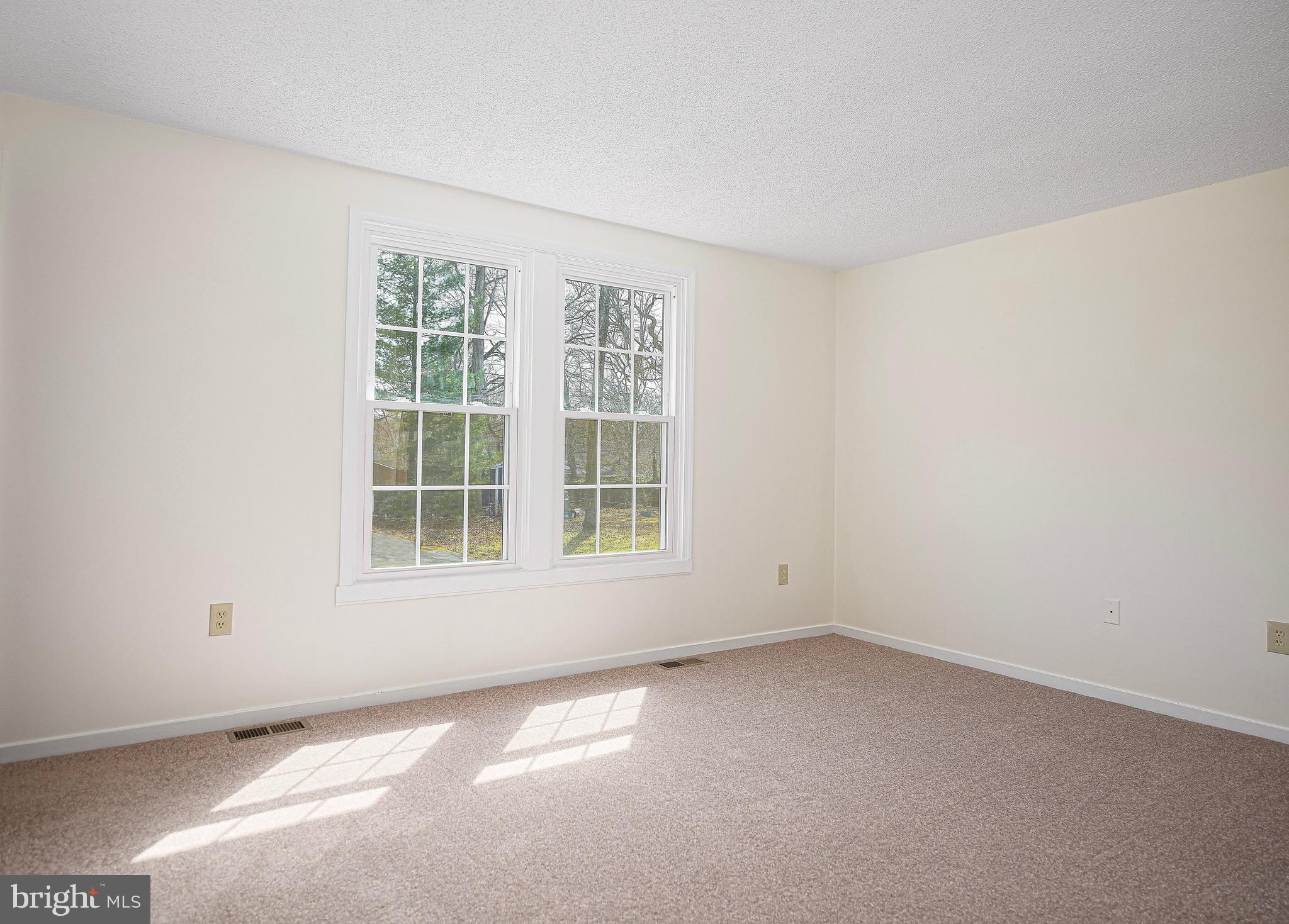 1811 Cape May Road Essex, MD 21221 - Photo 18 of 34 an empty room with a window
