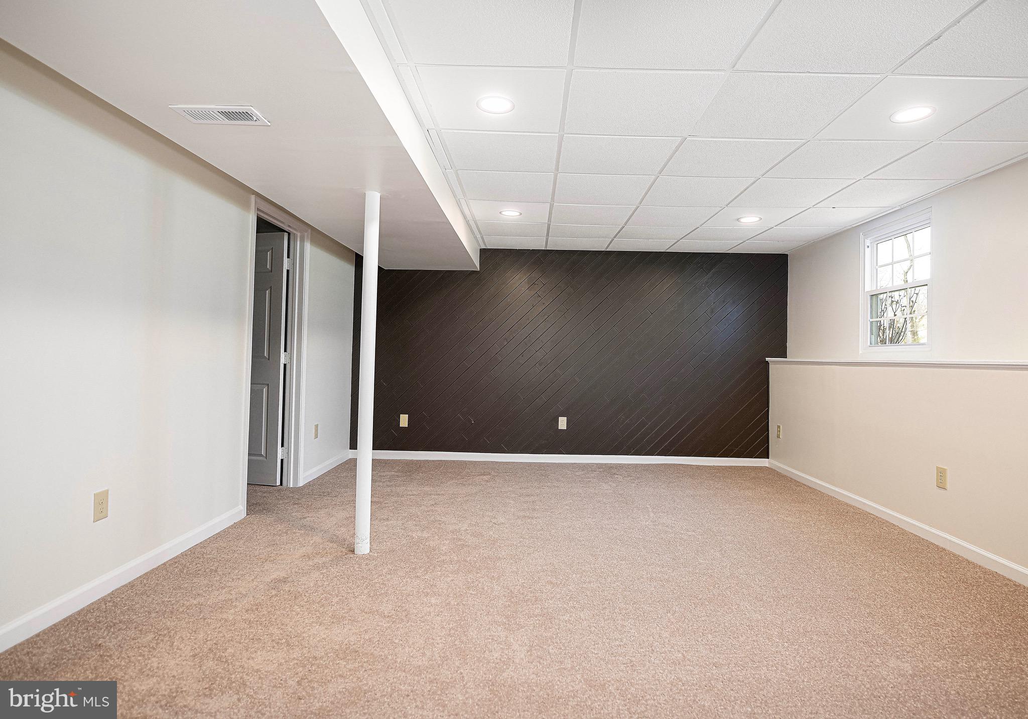 1811 Cape May Road Essex, MD 21221 - Photo 24 of 34 an empty room with windows