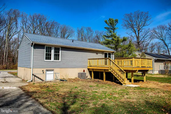 a house view with a backyard space