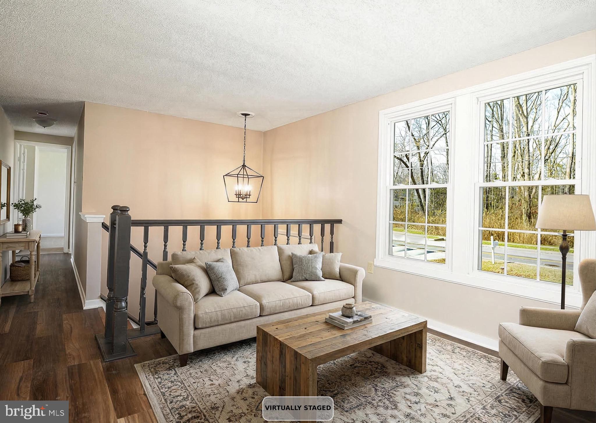 1811 Cape May Road Essex, MD 21221 - Photo 7 of 34 a living room with furniture and a window with wooden floor