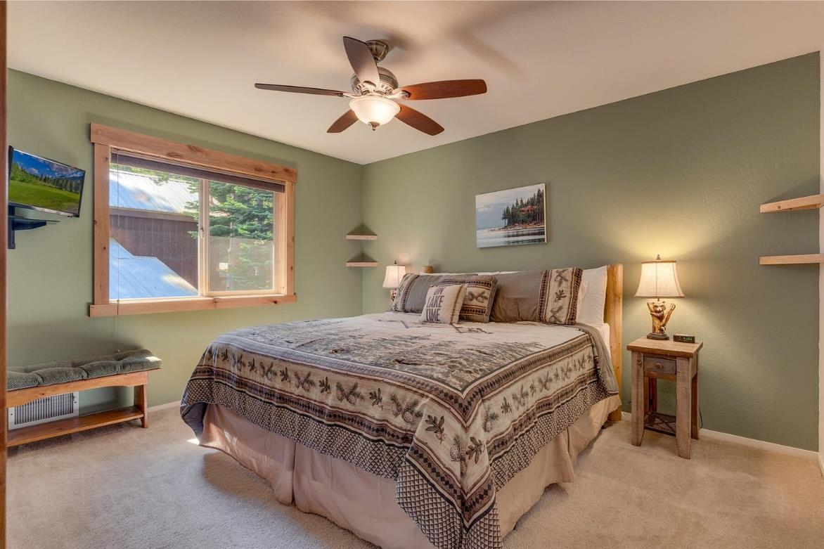 730 Cascade Circle Homewood, CA 96141 - Photo 14 of 22 a bedroom with a bed and a window